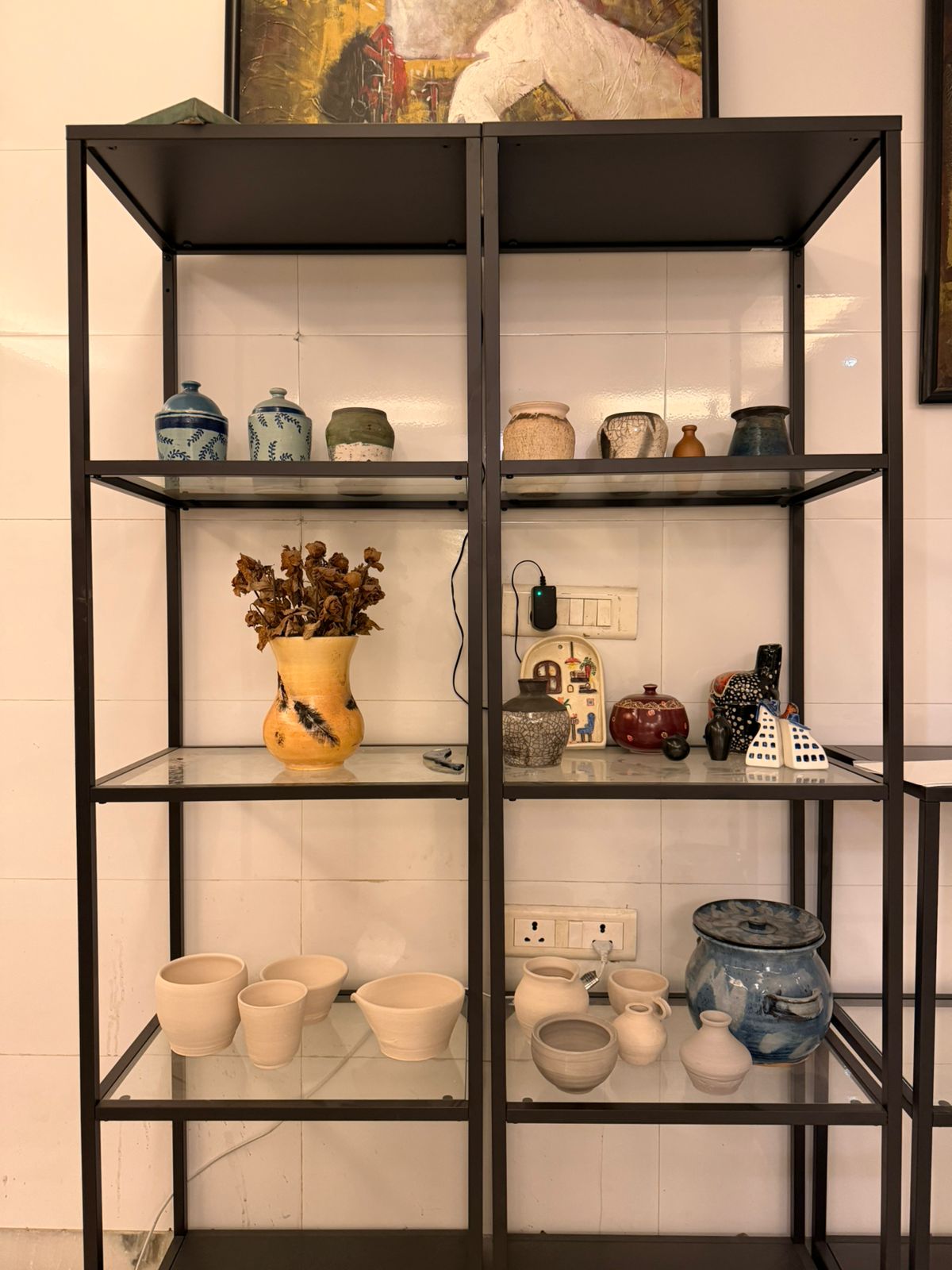 Display shelves with pottery