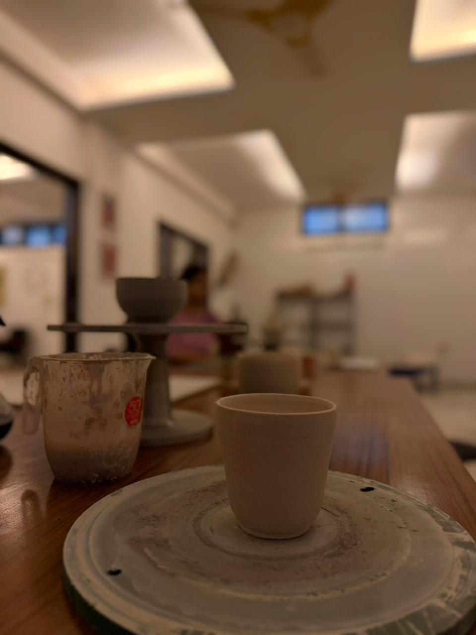Cup on wheel at Earthique